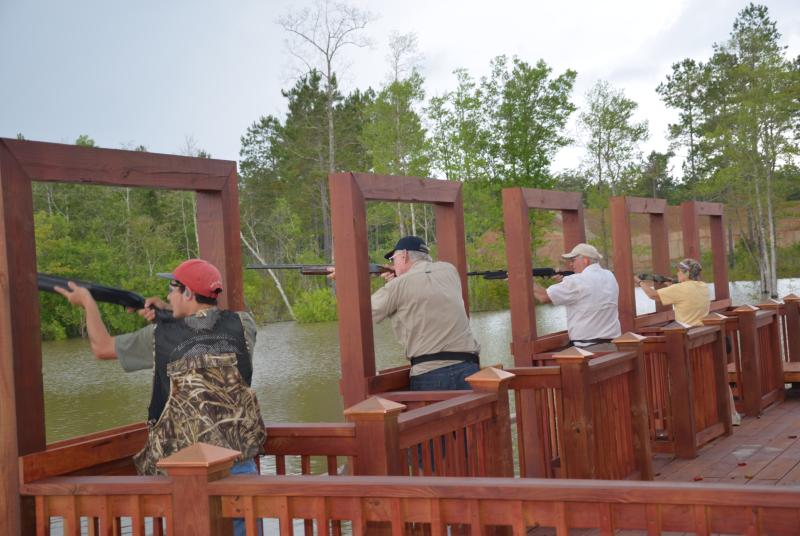 Group of people sighting targets at McHenry Range